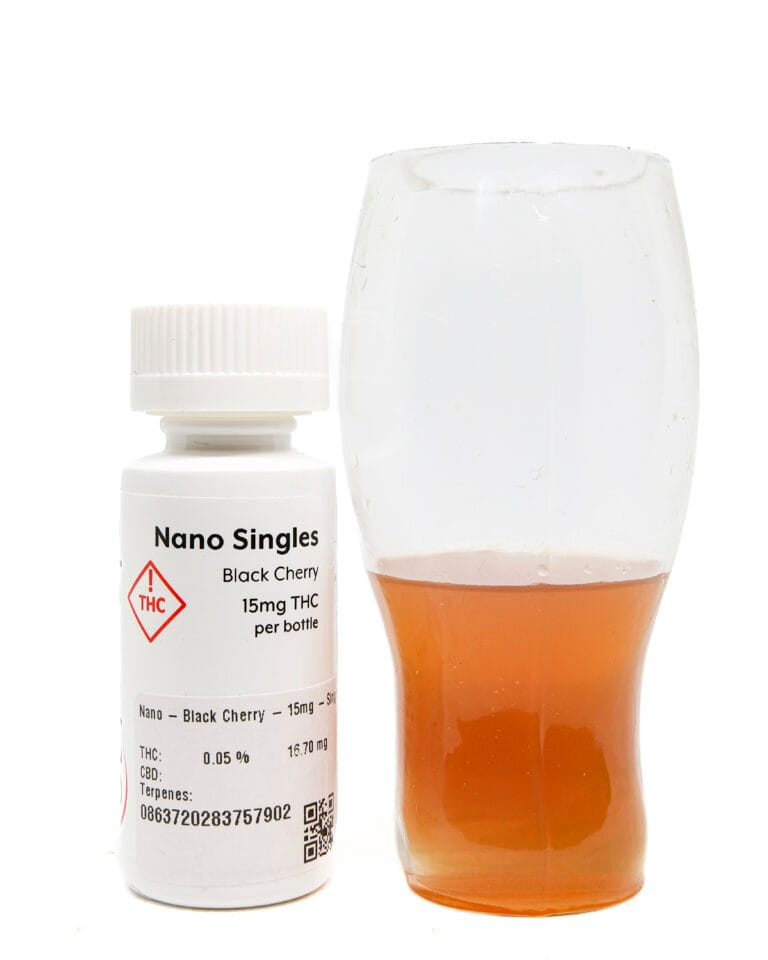 Black Cherry Nano 15mg THC tincture bottle and orange-tinted liquid additive from Planet 13